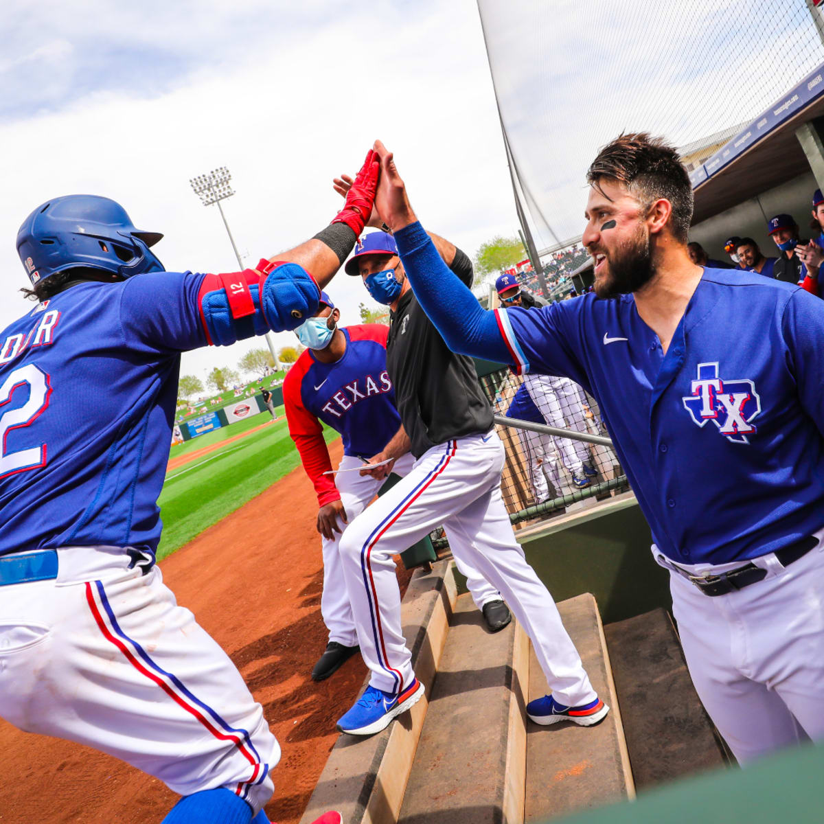 Rougned Odor makes diving stop in second start at third base for