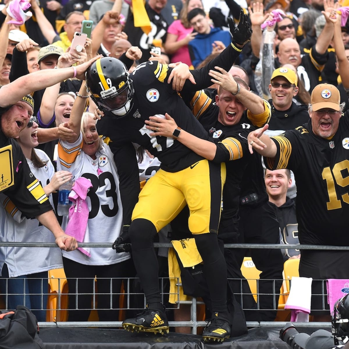 Steelers fan tattoos JuJu autograph atop head - ESPN