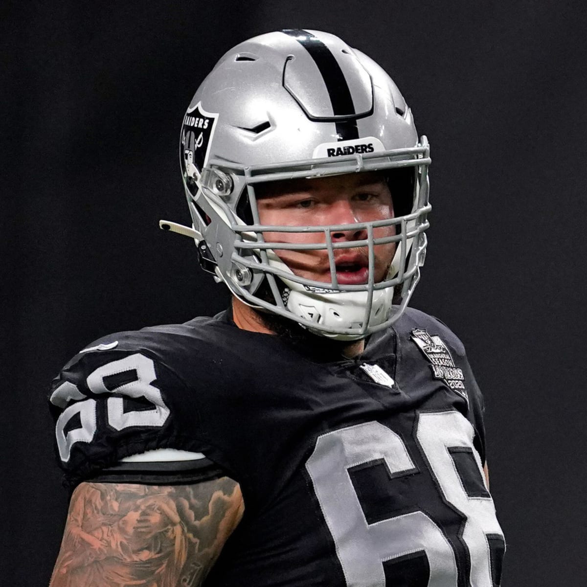 Las Vegas Raiders center Andre James (68) gets set on the line during an  NFL football