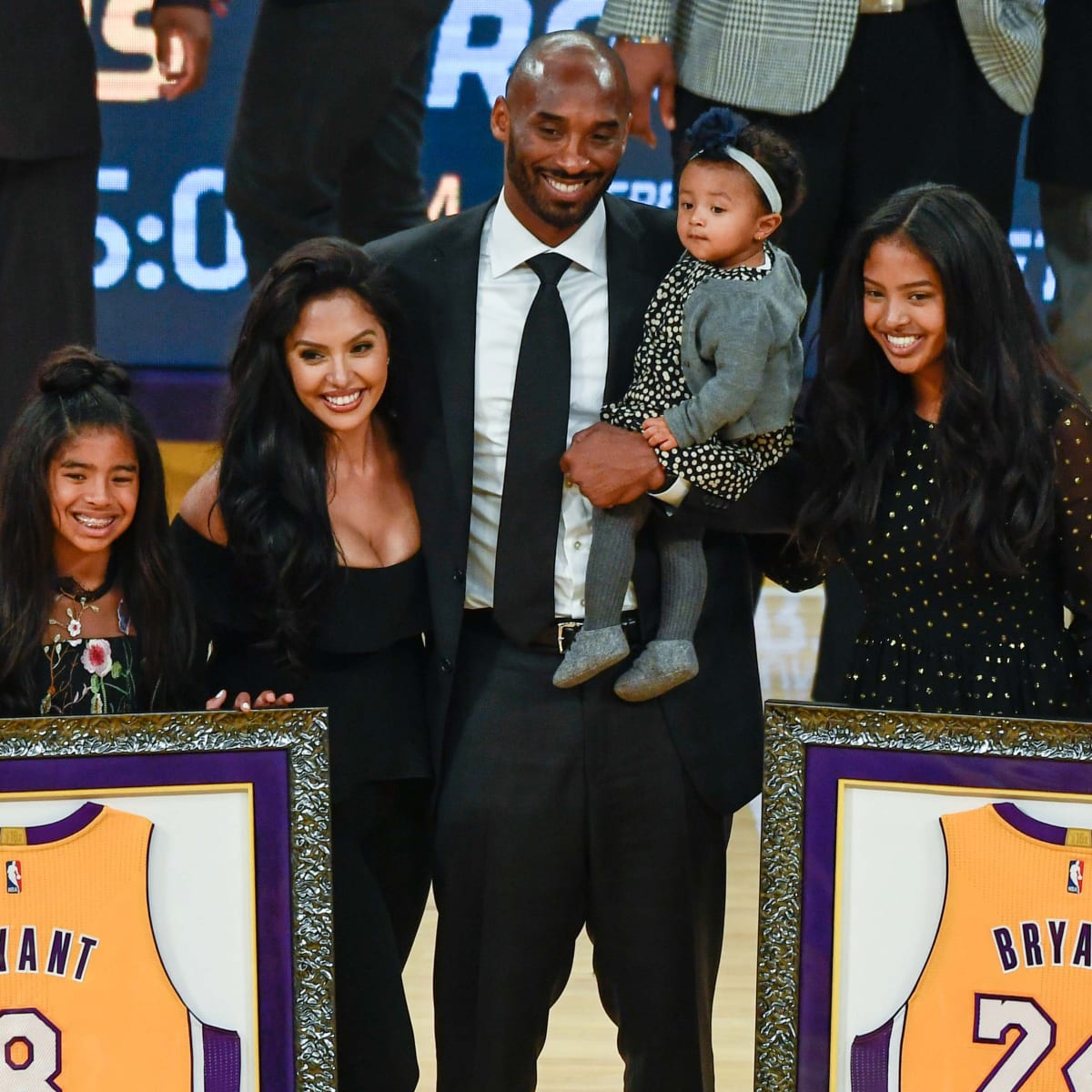 Vanessa Bryant, right, widow of Kobe Bryant, hugs Los Angeles