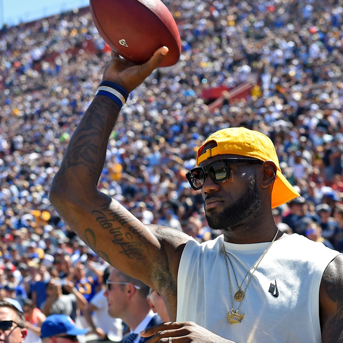 Sight of LeBron James in a football uniform reinforces he'd fit in just  fine on a NFL field