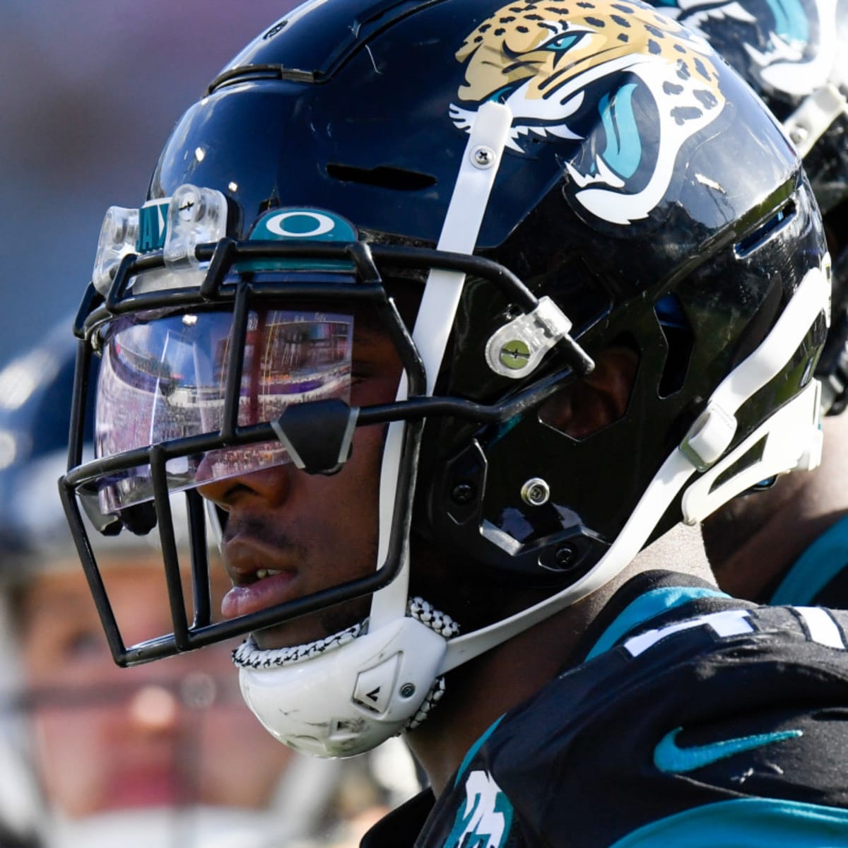 Jaguars promote S Loston, waive rookie DE Smith