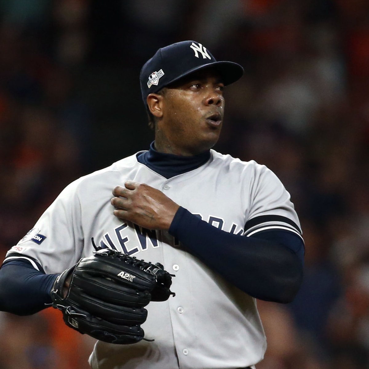 New York Yankees relief pitcher Aroldis Chapman celebrates after the final  out in the 9th inning in game 3 against the Cleveland Indians in the 2017  MLB Playoffs American League Divisional Series