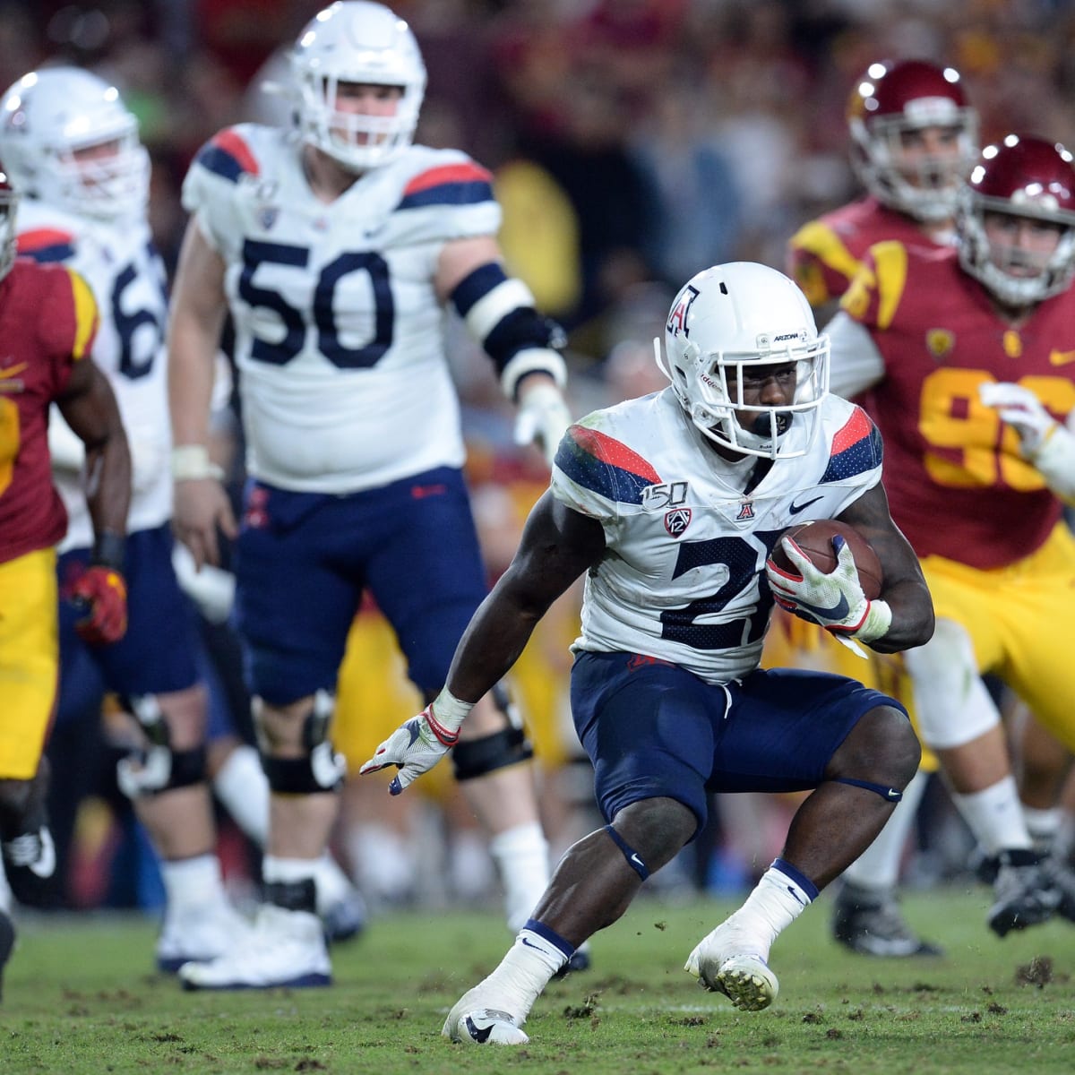 Former Arizona running back J.J. Taylor gets big chunk of