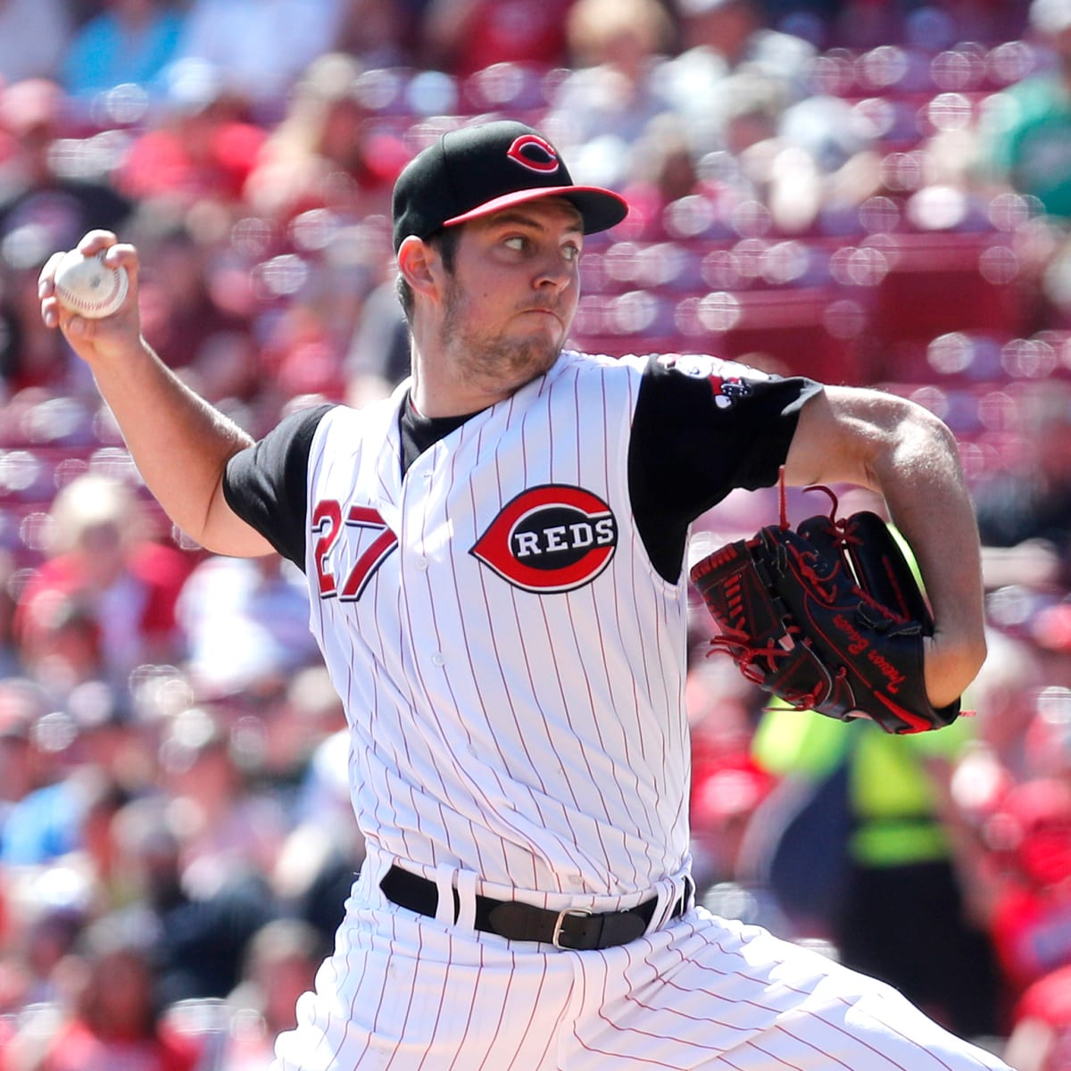 Cleveland Indians Trevor Bauer adorns a baseball with hair made