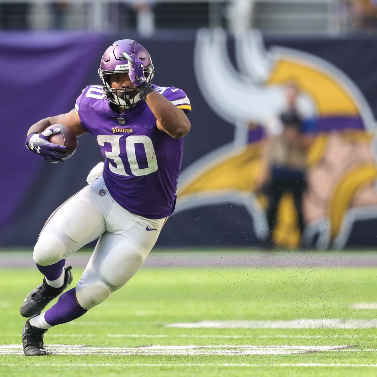 Minnesota Vikings fullback C.J. Ham (30) runs from Indianapolis