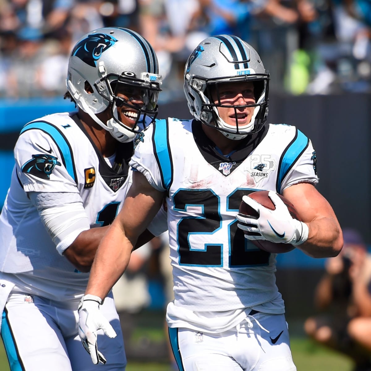 Carolina Panthers quarterback Cam Newton (1) leads the huddle in