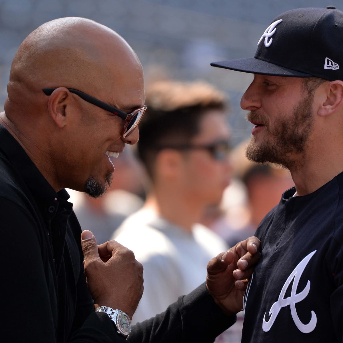 Former Atlanta Braves player David Justice, right, hugs Braves third  baseman Chipper Jones after Justice was inducted into the Braves Hall of  Fame before the Braves' baseball game against the Arizona Diamondbacks