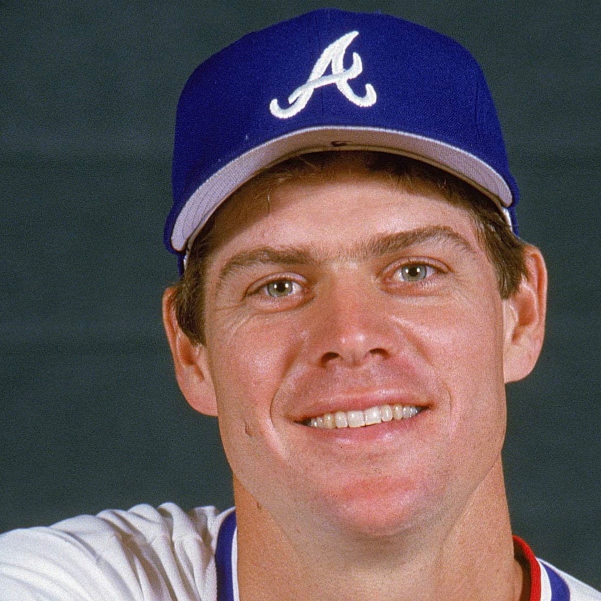 Dale Murphy of the Atlanta Braves follows through on his swing