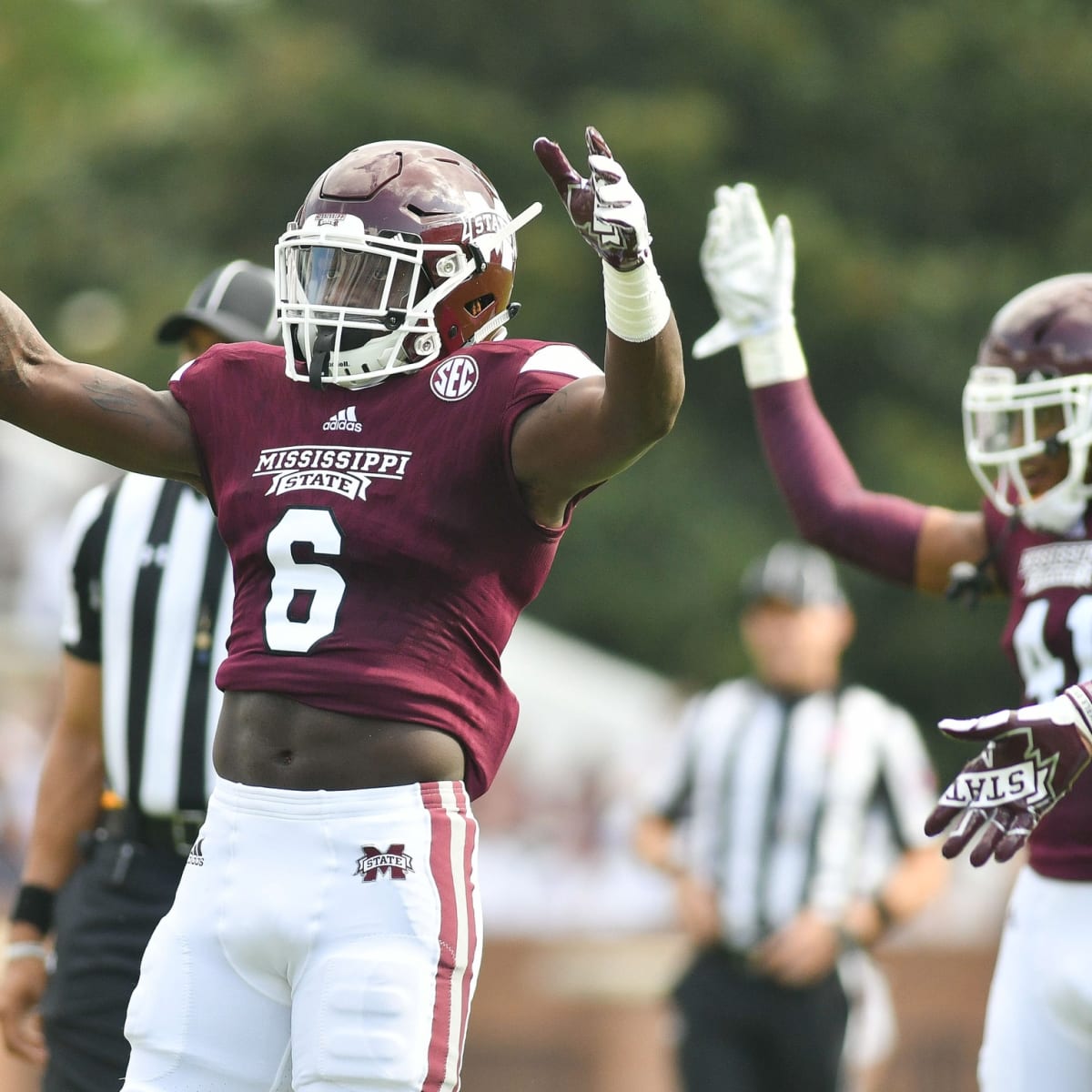 Mississippi State linebacker Willie Gay Jr. talks with Texans