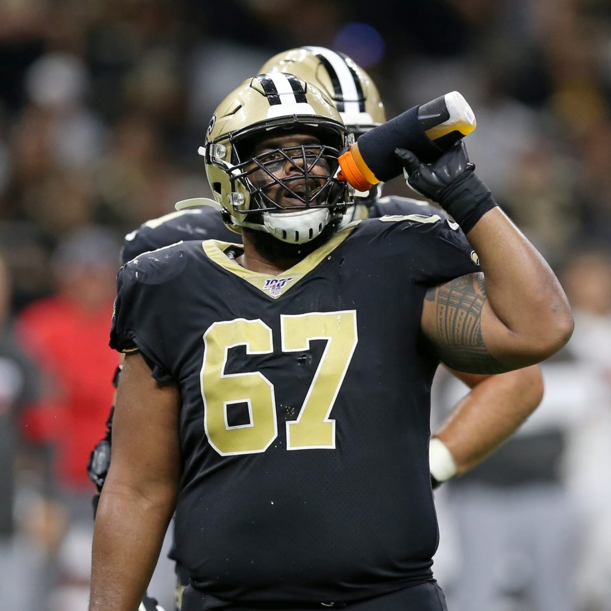 Tampa, Florida, USA. 09th Dec, 2018. New Orleans Saints offensive guard  Andrus Peat (75), New Orleans Saints center Max Unger (60) and New Orleans  Saints offensive guard Larry Warford (67) during the