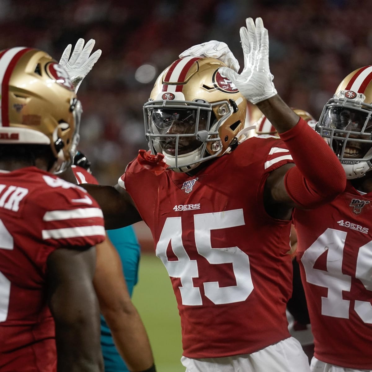 San Francisco 49ers tight end Charlie Woerner (89) congratulates linebacker  Demetrius Flannigan-Fowles (45) after a tackle during an NFL football game  against the New Orleans Saints, Sunday, Nov.27, 2022, in Santa Clara