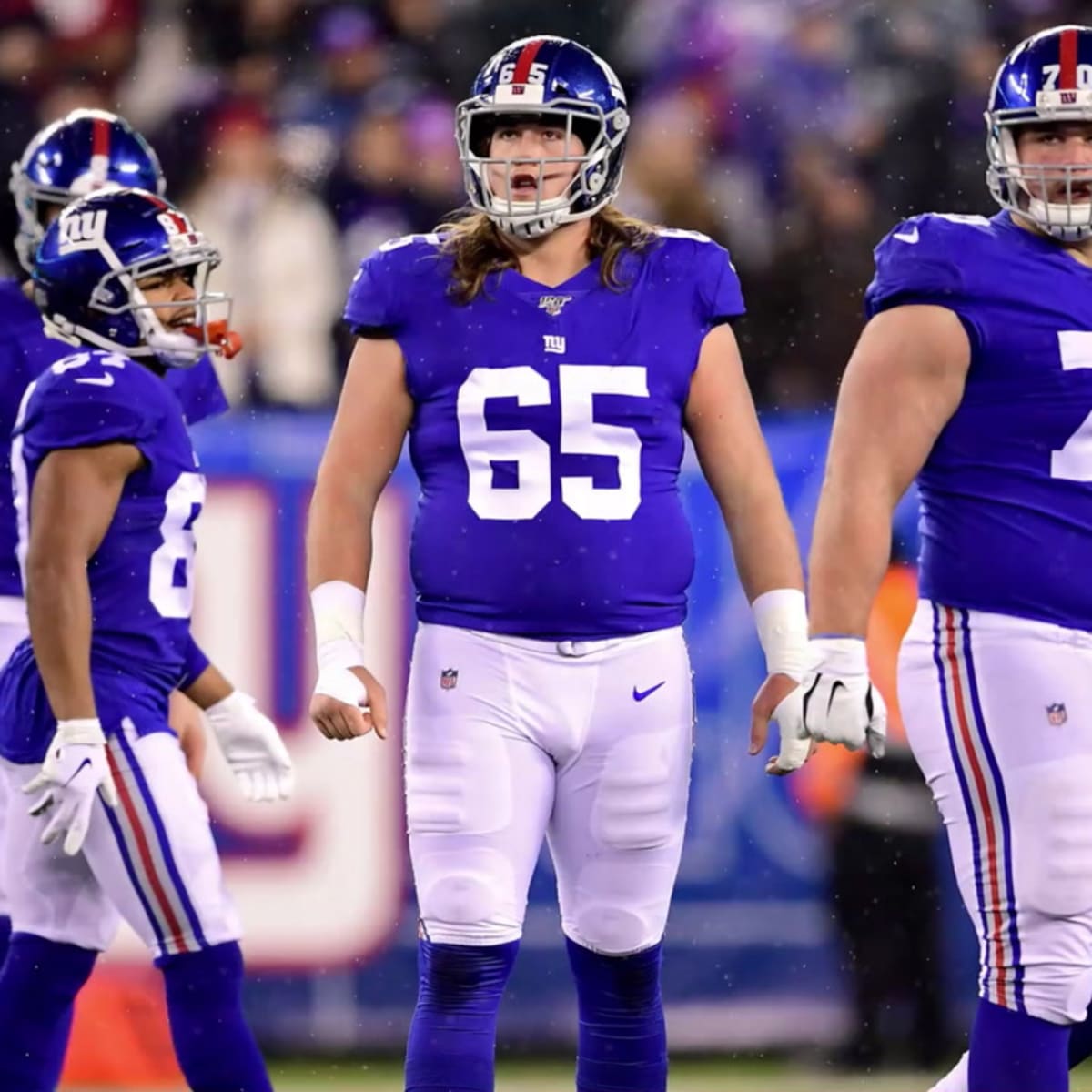 New York Giants offensive guard Nick Gates (65) looks to block