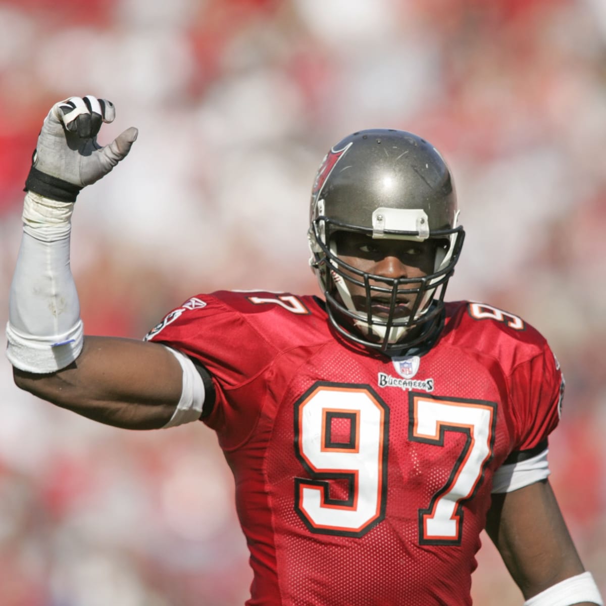 Tampa Bay Buccaneers' Simeon Rice (97) removes his gloves with 30 seconds  left in the fourth quarter in the Buc's 37-20 loss against the Carolina  Panthers at Raymond James Stadium in Tampa