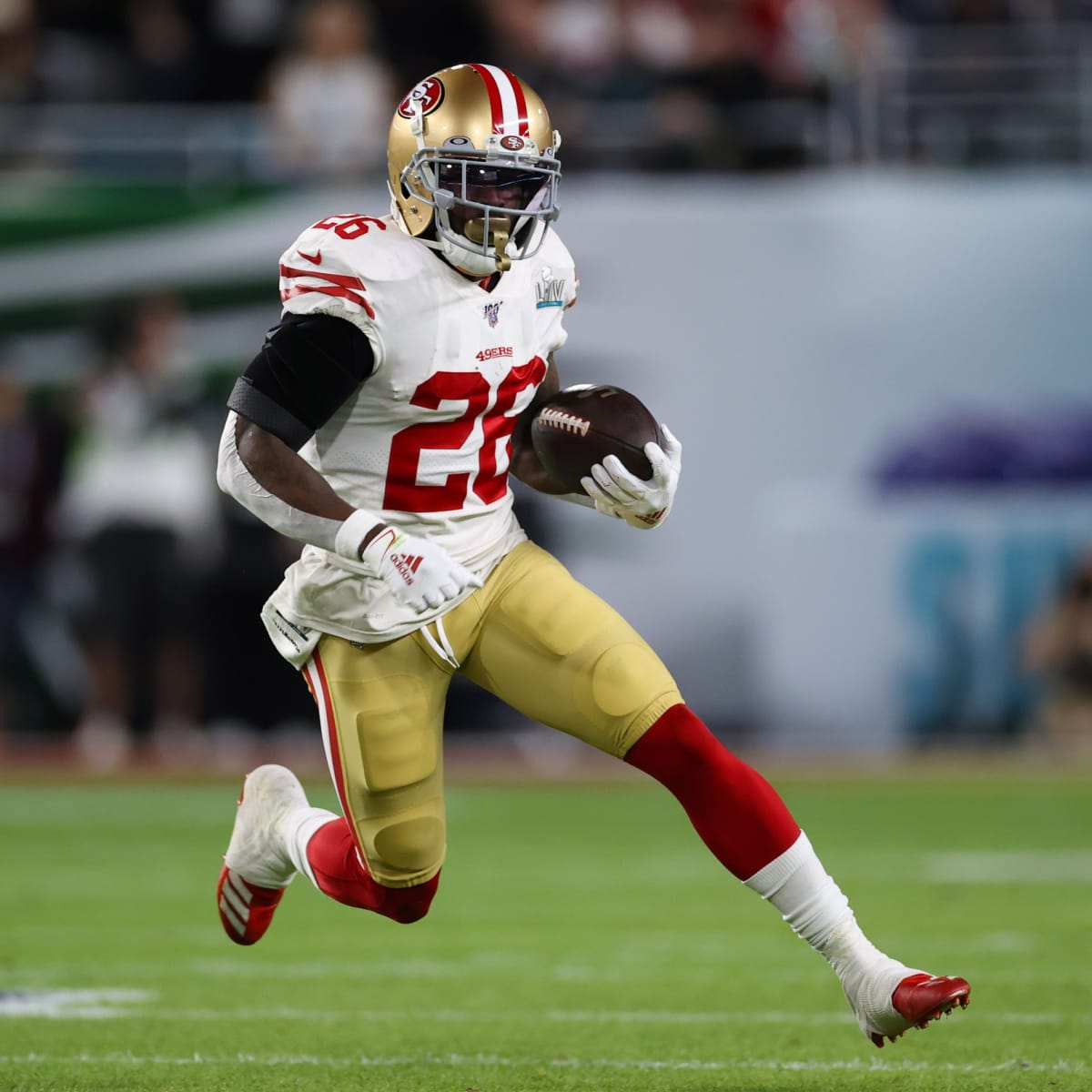 San Francisco 49ers' Tevin Coleman (26) runs against the Kansas City Chiefs  during the first ha …