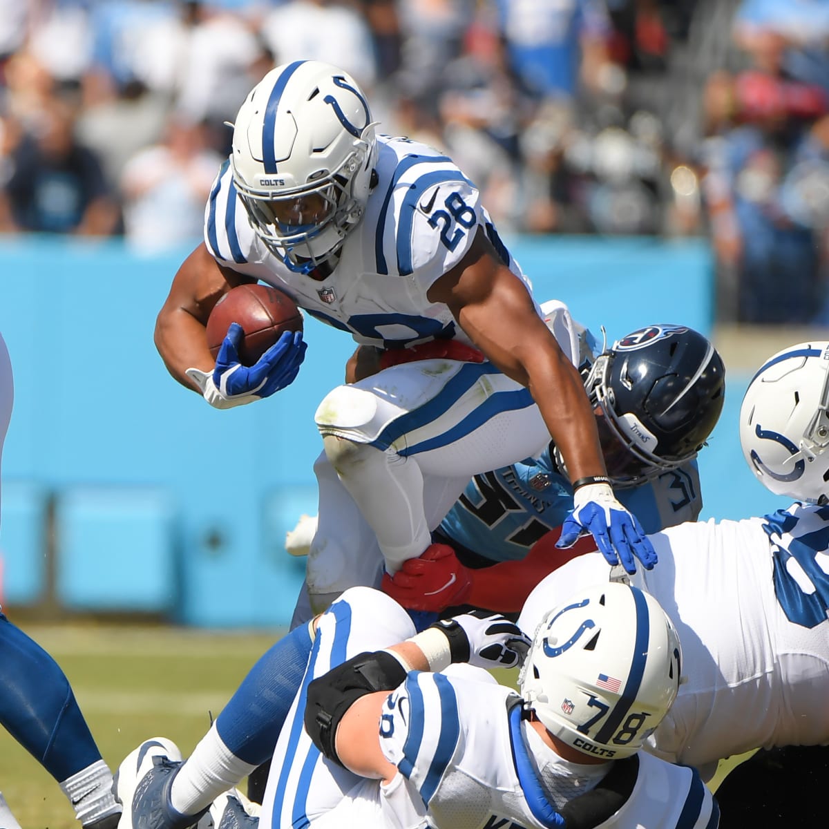 Ryan Tannehill throws 3 TDs as Titans hold off Colts 25-16