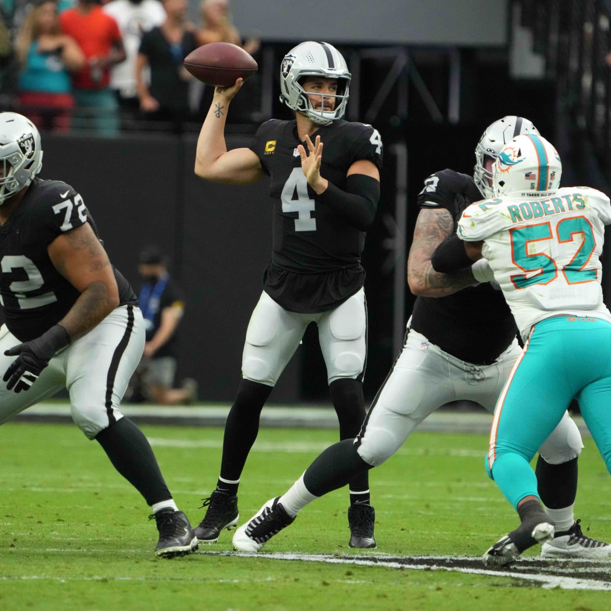 Miami Dolphins middle linebacker Elandon Roberts (52) makes an interception  against the Las Veg …