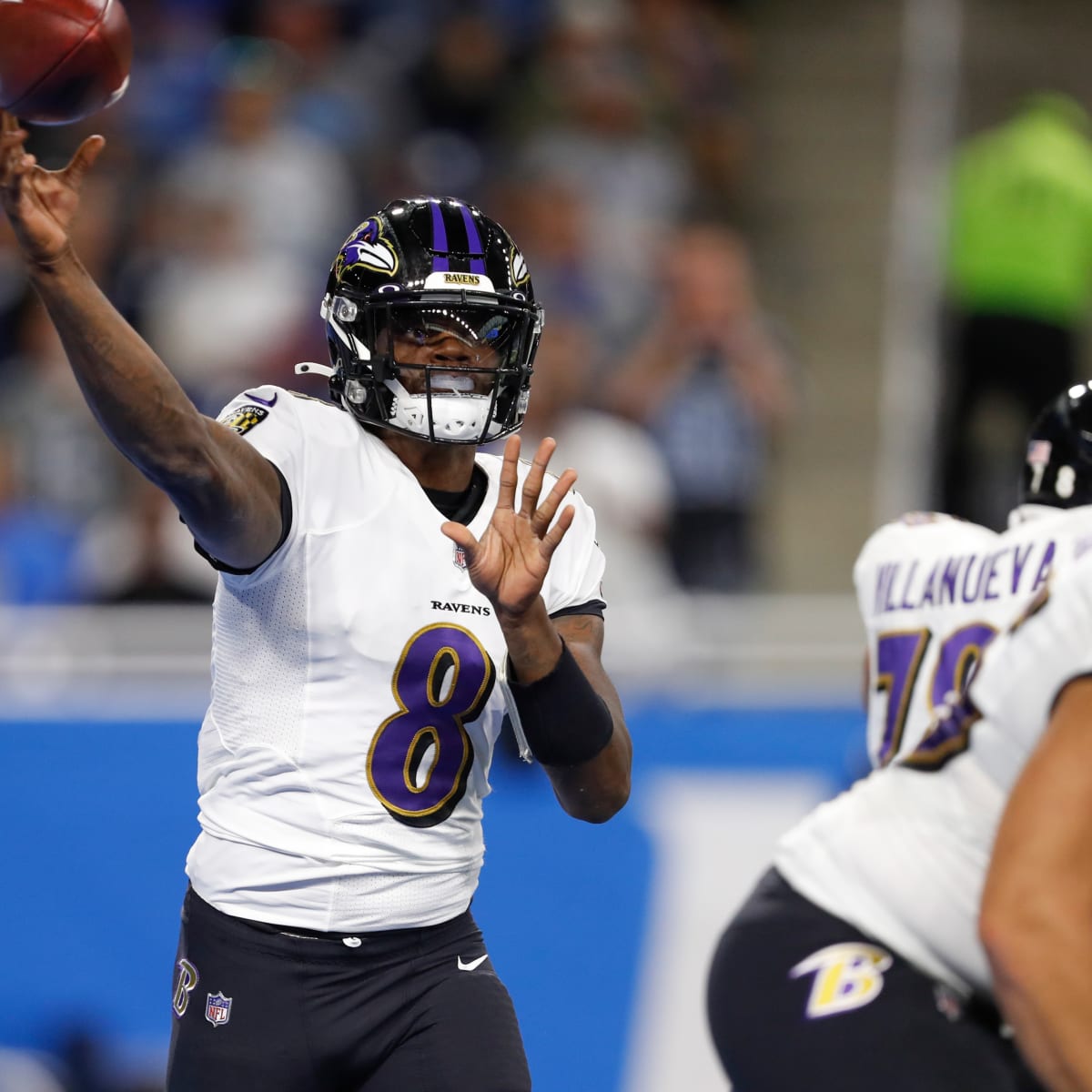 Baltimore Ravens quarterback Lamar Jackson (8) throws the ball as he is hit  by Minnesota Vikings defensive tackle Armon Watts (96) during the second  half of an NFL football game, Sunday, Nov.