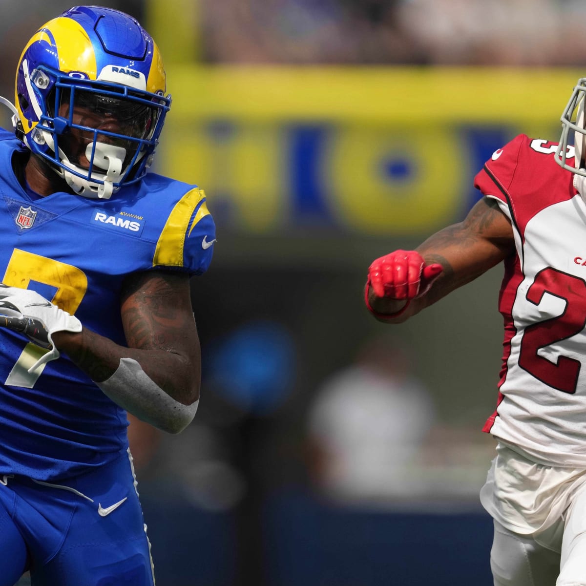 Los Angeles Rams running back Darrell Henderson Jr., center, scores a  rushing touchdown during the second half of an NFL football game against  the Arizona Cardinals Sunday, Nov. 13, 2022, in Inglewood