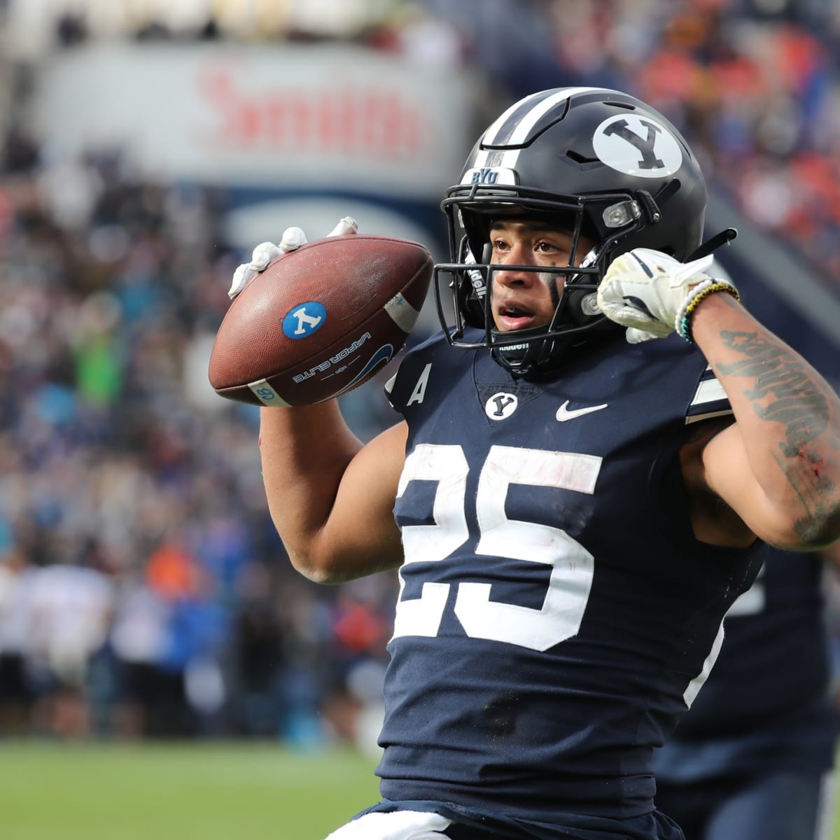 BYU running back Tyler Allgeier (25) takes knee during an NCAA college  football game against Virginia Saturday, Oct. 30, 2021, in Provo, Utah. (AP  Photo/George Frey Stock Photo - Alamy