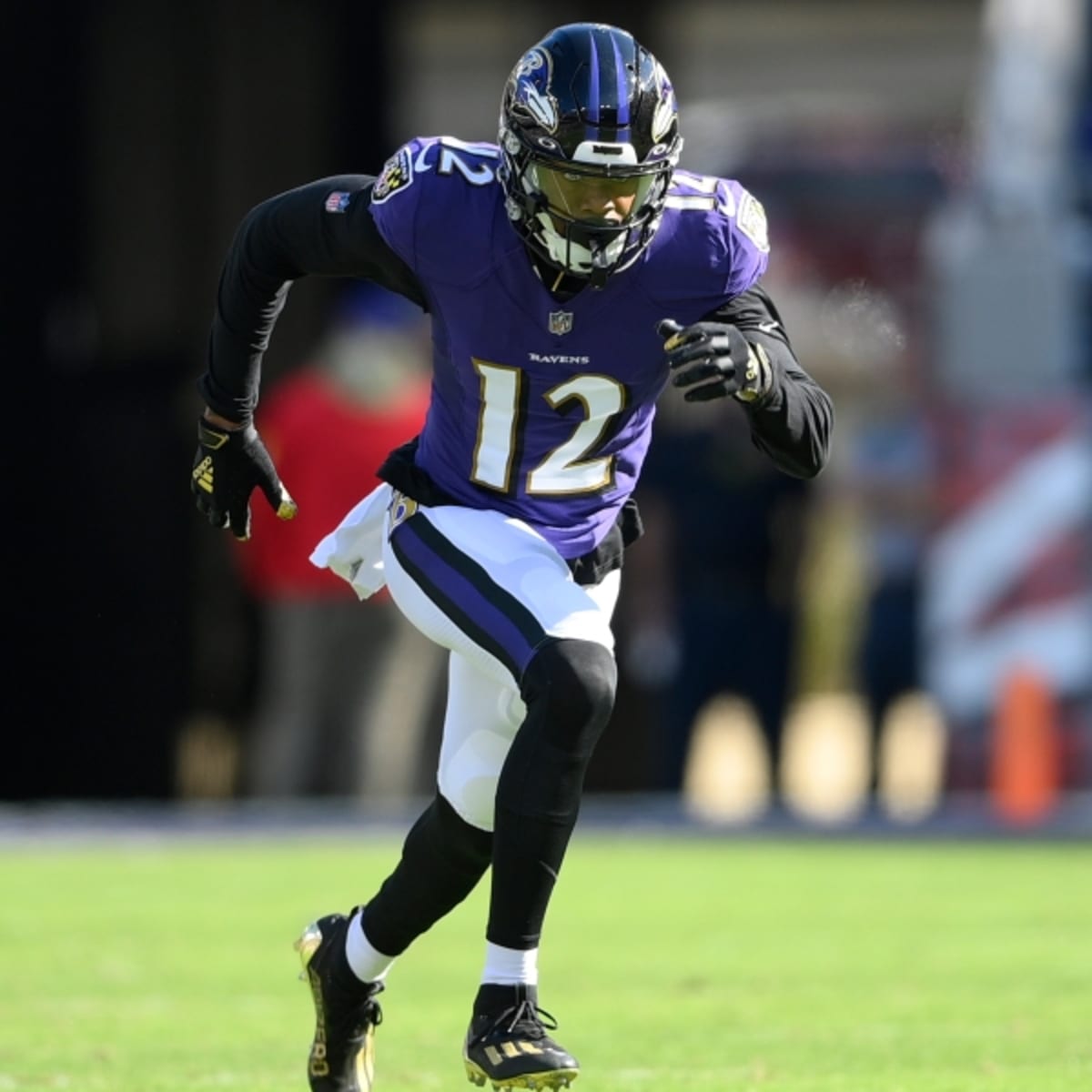 Baltimore Ravens wide receiver Rashod Bateman (7) warms up prior