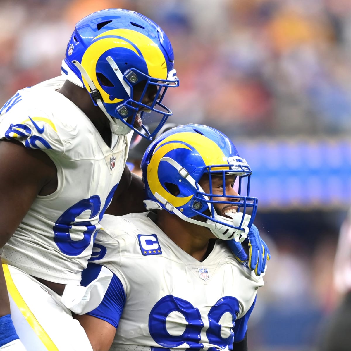 Los Angeles Rams defensive end Aaron Donald (99) celebrates a defensive  stop with defensive tackle Sebastian Joseph-Day (69) during the second half  of an NFL football game against the Tampa Bay Buccaneers