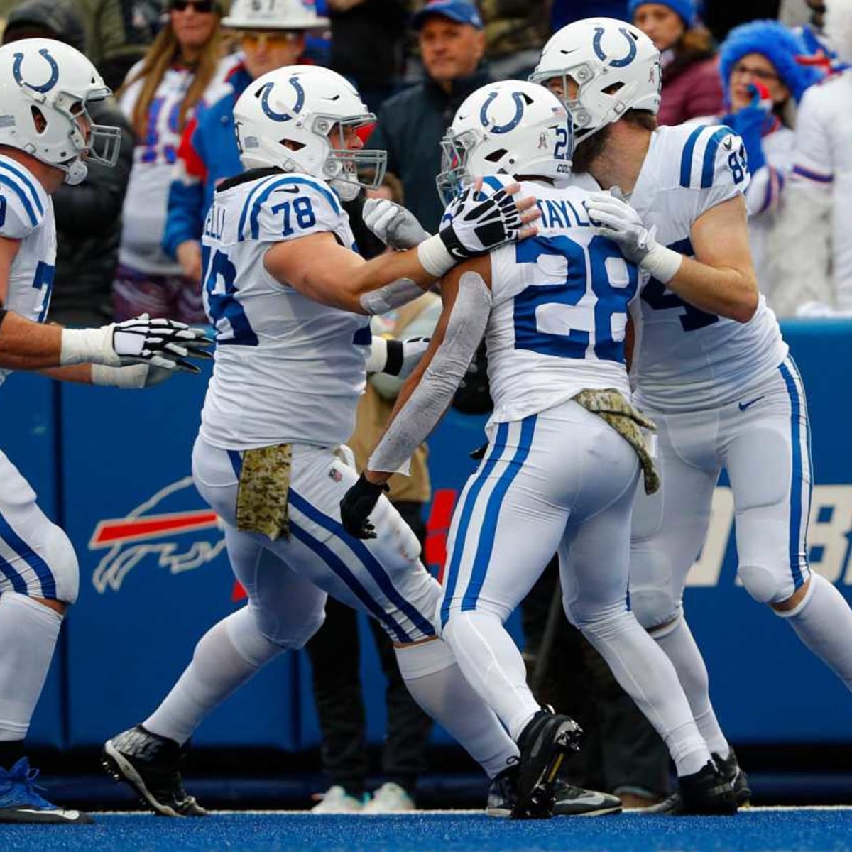 Taylor runs up the score with 5 TDs; Colts beat Bills 41-15