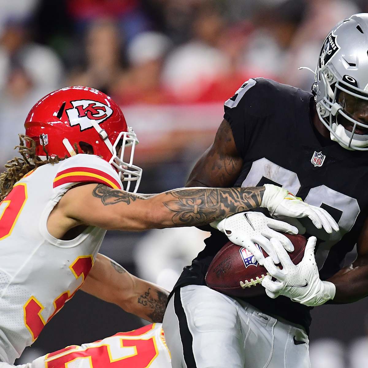 Las Vegas Raiders wide receiver DeSean Jackson (10) celebrates after a  touchdown by wide receiver Bryan Edwards (89) during the third quarter  against the Kansas City Chiefs in an NFL football game