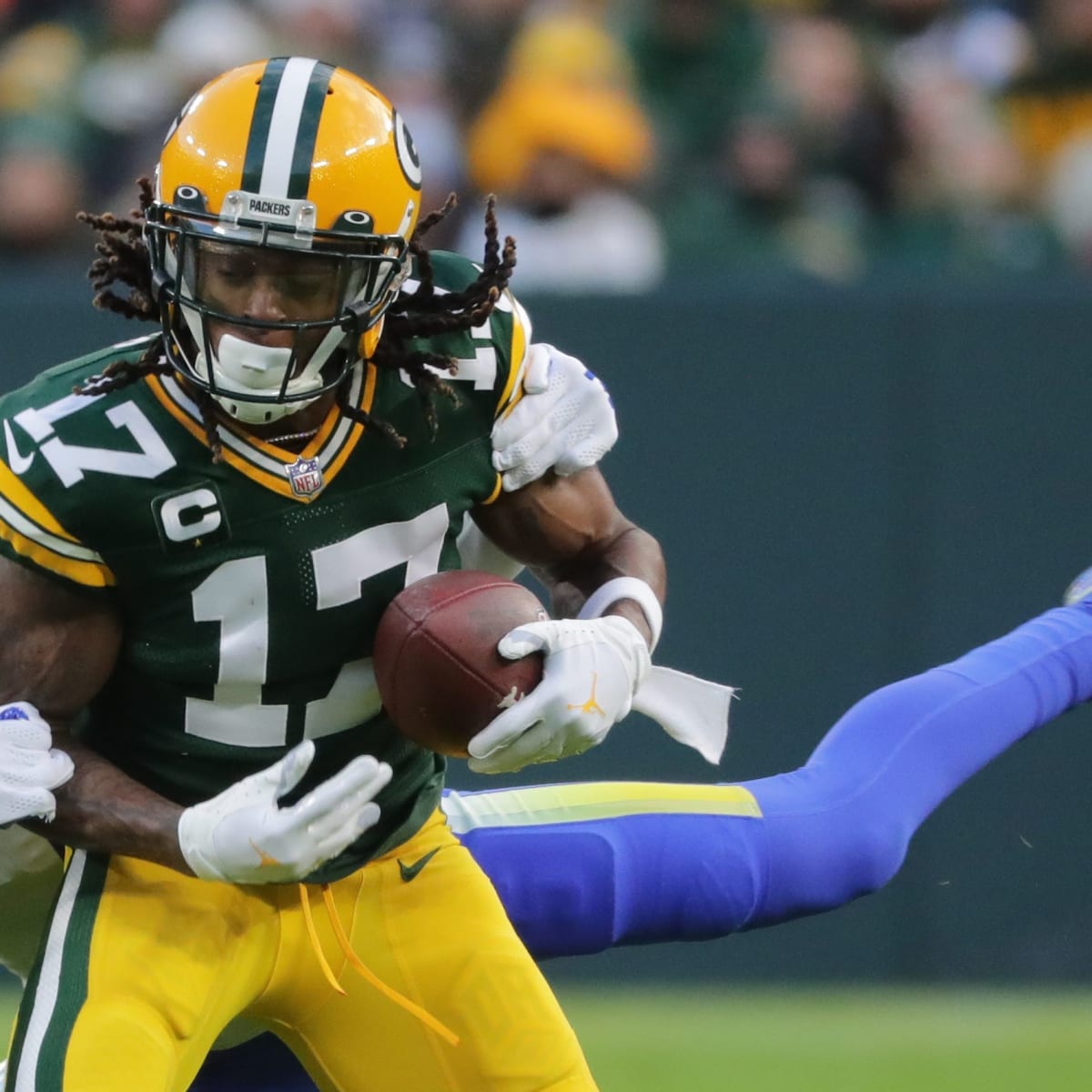 Packers hang on to beat Rams, 36-28