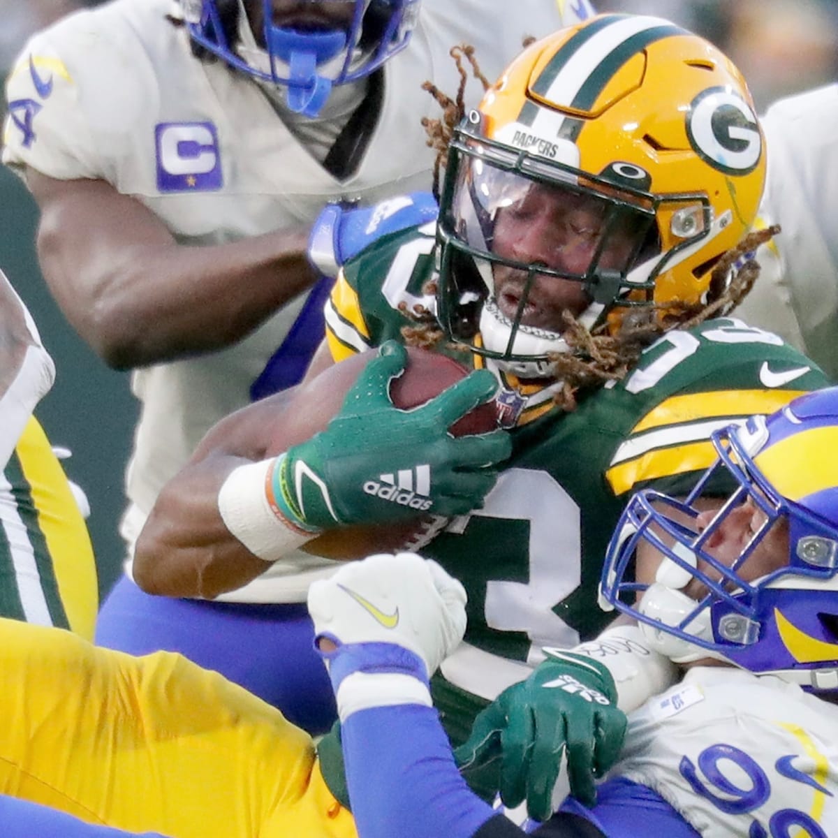 AJ Dillon helps Packers power past Rams, 36-28, as Aaron Jones returns