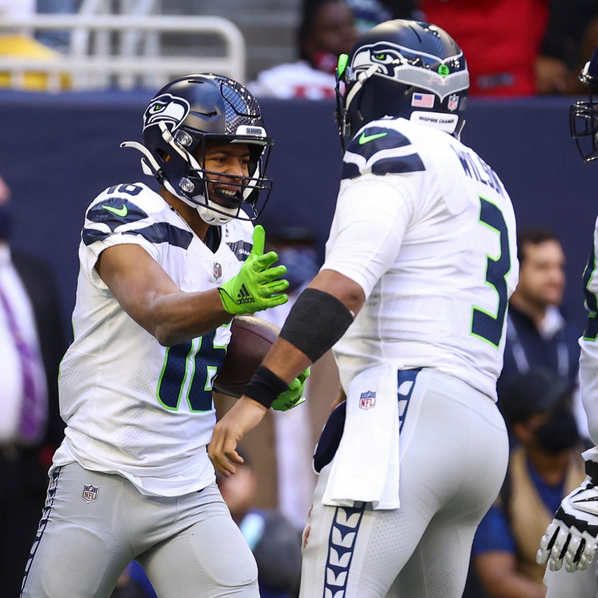 HOUSTON, TX - DECEMBER 12: Seattle Seahawks DE Darrell Taylor watches  action during game featuring the Houston Texans and the Seattle Seahawks on  December 12, 2021 at NRG Stadium in Houston, TX. (