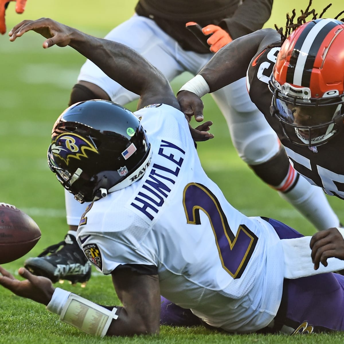 Cleveland Browns defensive end Takkarist McKinley (55) runs after the ball  during an NFL football game against the Baltimore Ravens, Sunday, Dec. 12,  2021, in Cleveland. (AP Photo/Kirk Irwin Stock Photo - Alamy