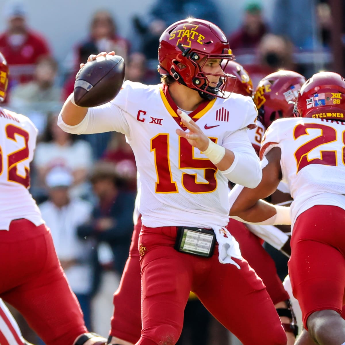 Quarterback Brock Purdy of the Iowa State Cyclones is sacked by