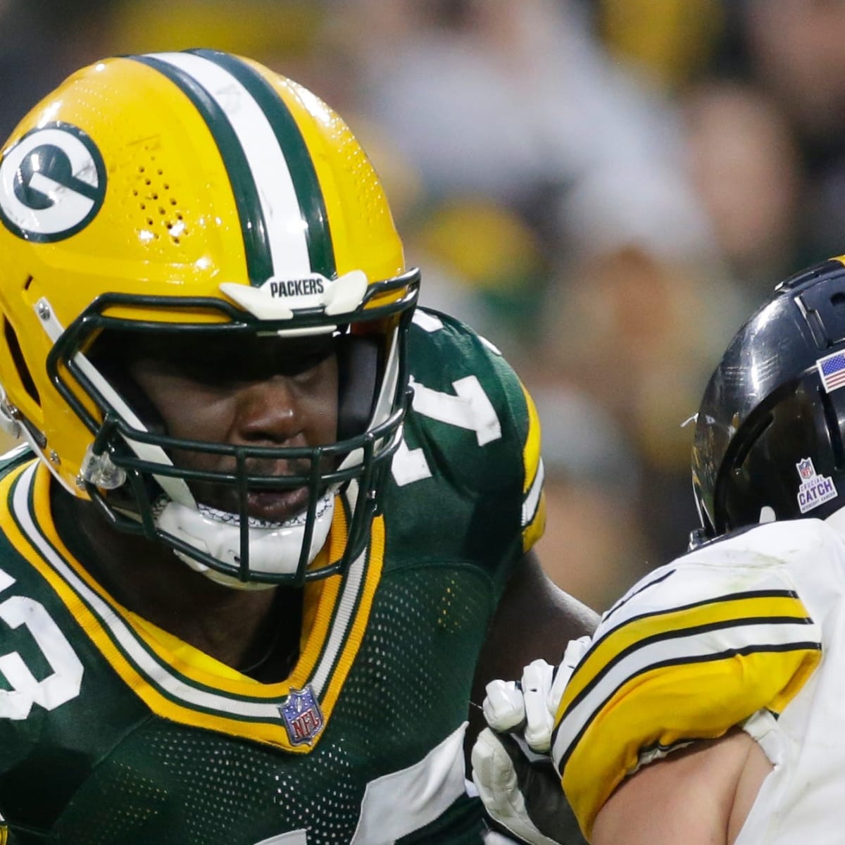 Green Bay Packers offensive tackle Yosh Nijman (73) stands on the field  during the first half of an NFL football game against the Minnesota  Vikings, Sunday, Sept. 11, 2022, in Minneapolis. (AP