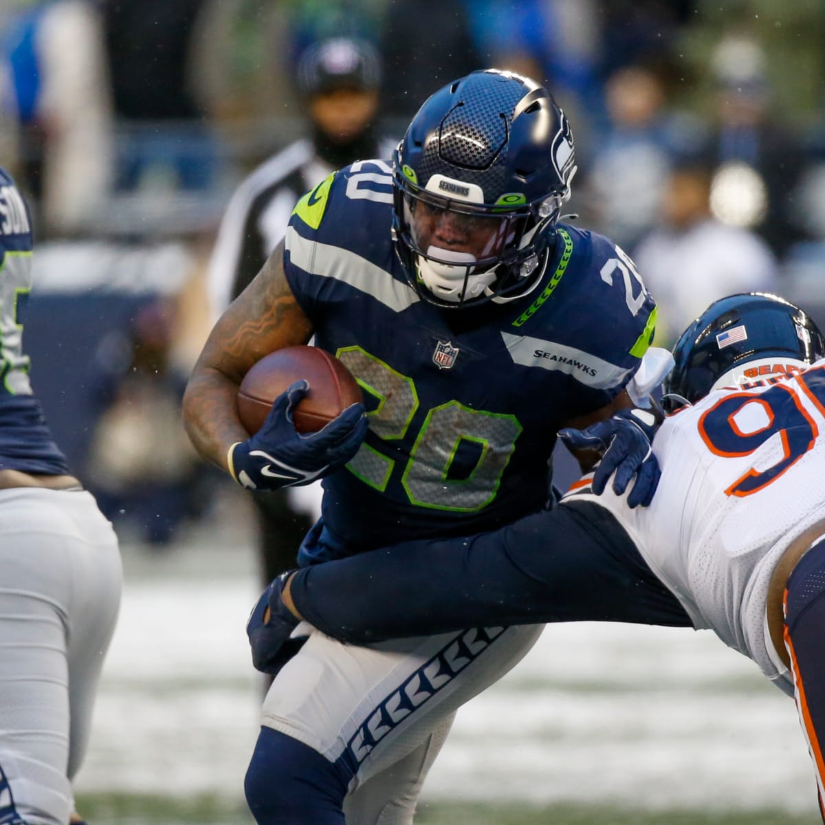 September 25, 2022: Seattle Seahawks running back Rashaad Penny (20) runs  the ball during a game between the Atlanta Falcons and Seattle Seahawks at  Lumen Field in Seattle, WA. The Falcons won