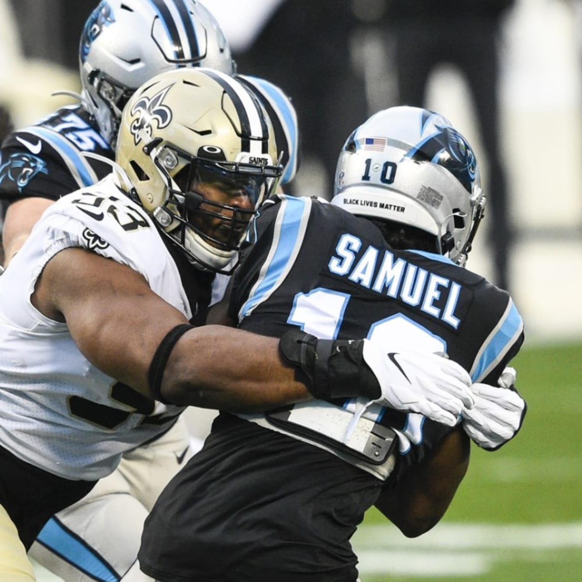 Carolina Panthers quarterback Cam Newton (1) carries against New Orleans  Saints cornerback P.J. Williams in the