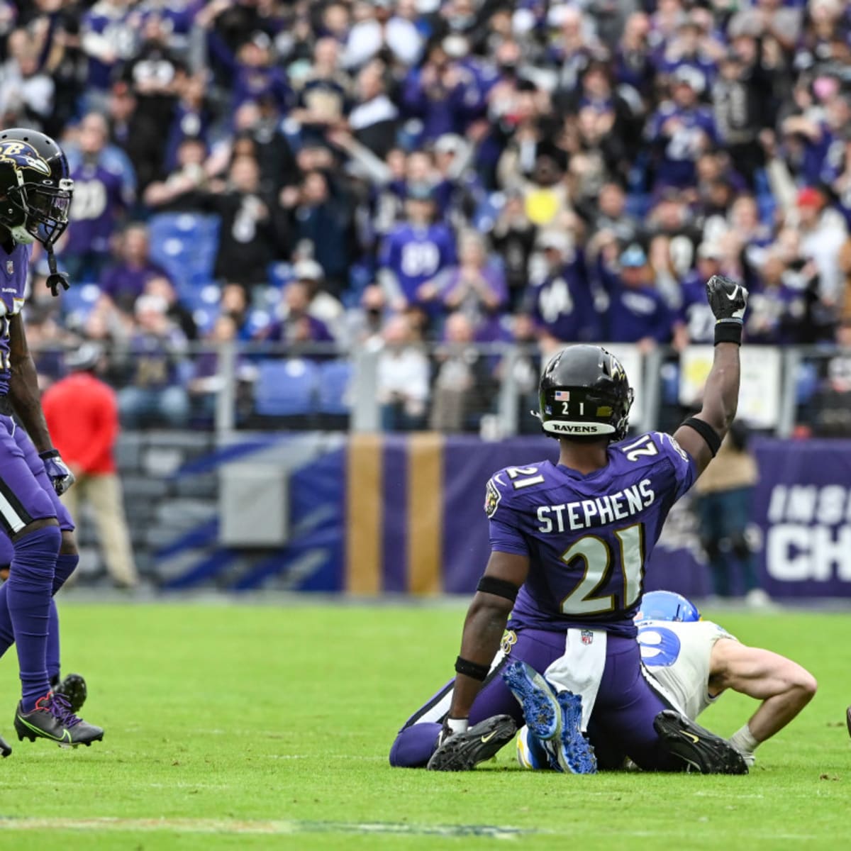 Baltimore Ravens cornerback Brandon Stephens (21) stands on the field  before the start of an NFL