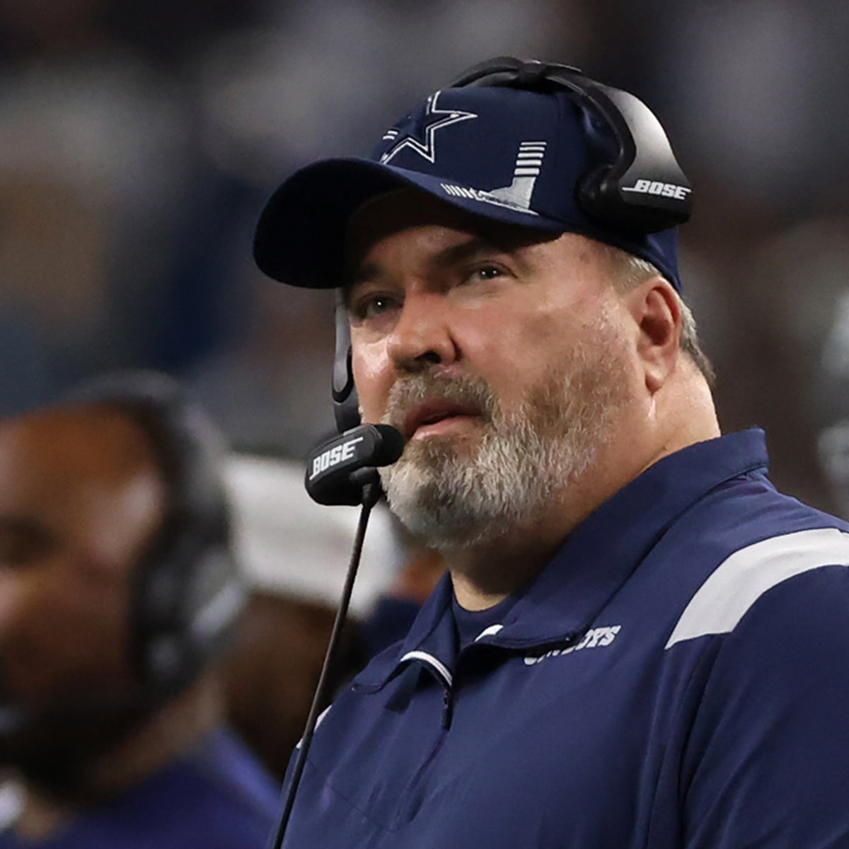 Dallas Cowboys head coach Mike McCarthy talks with line judge Mark