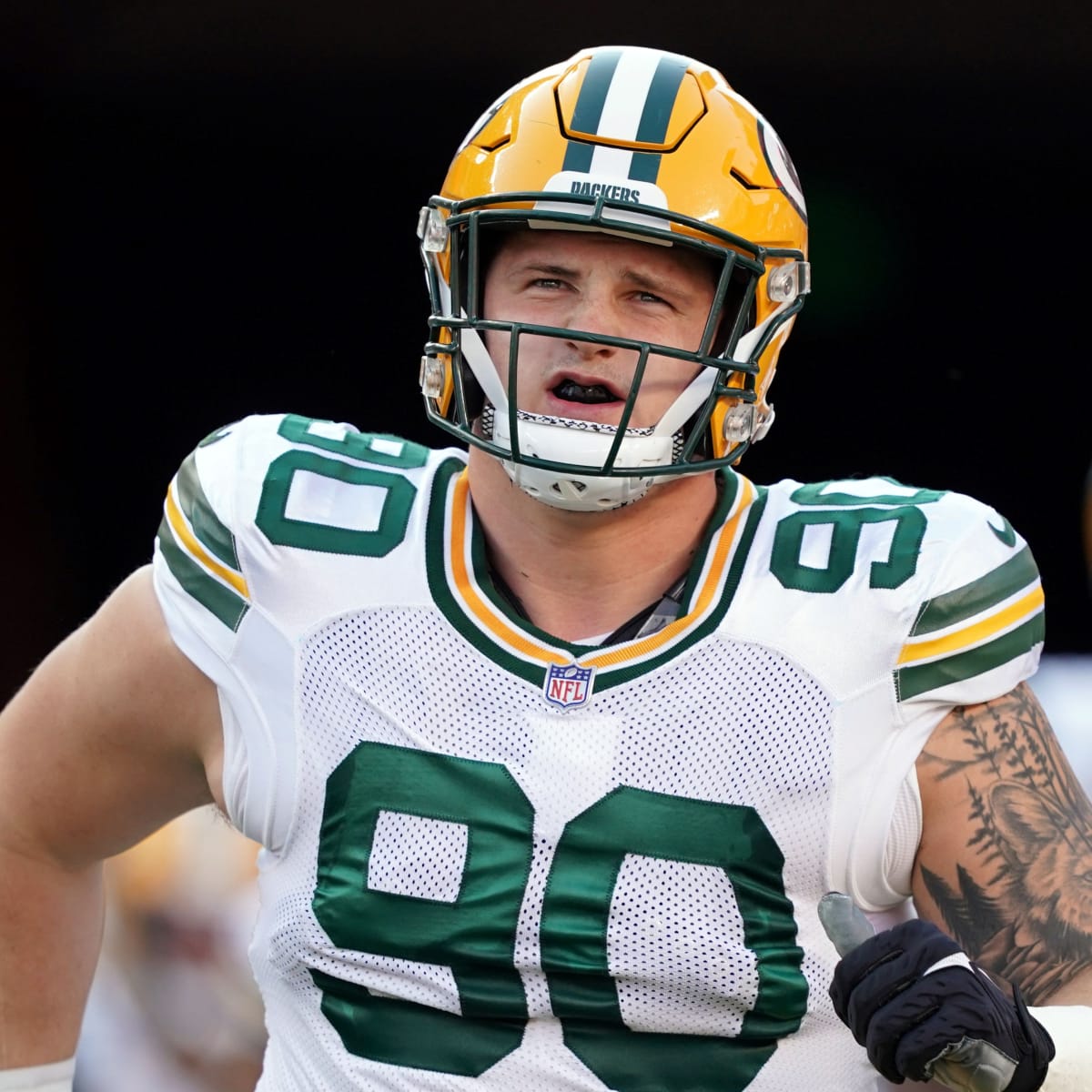 Jack Heflin of the Green Bay Packers walks off the field after the News  Photo - Getty Images