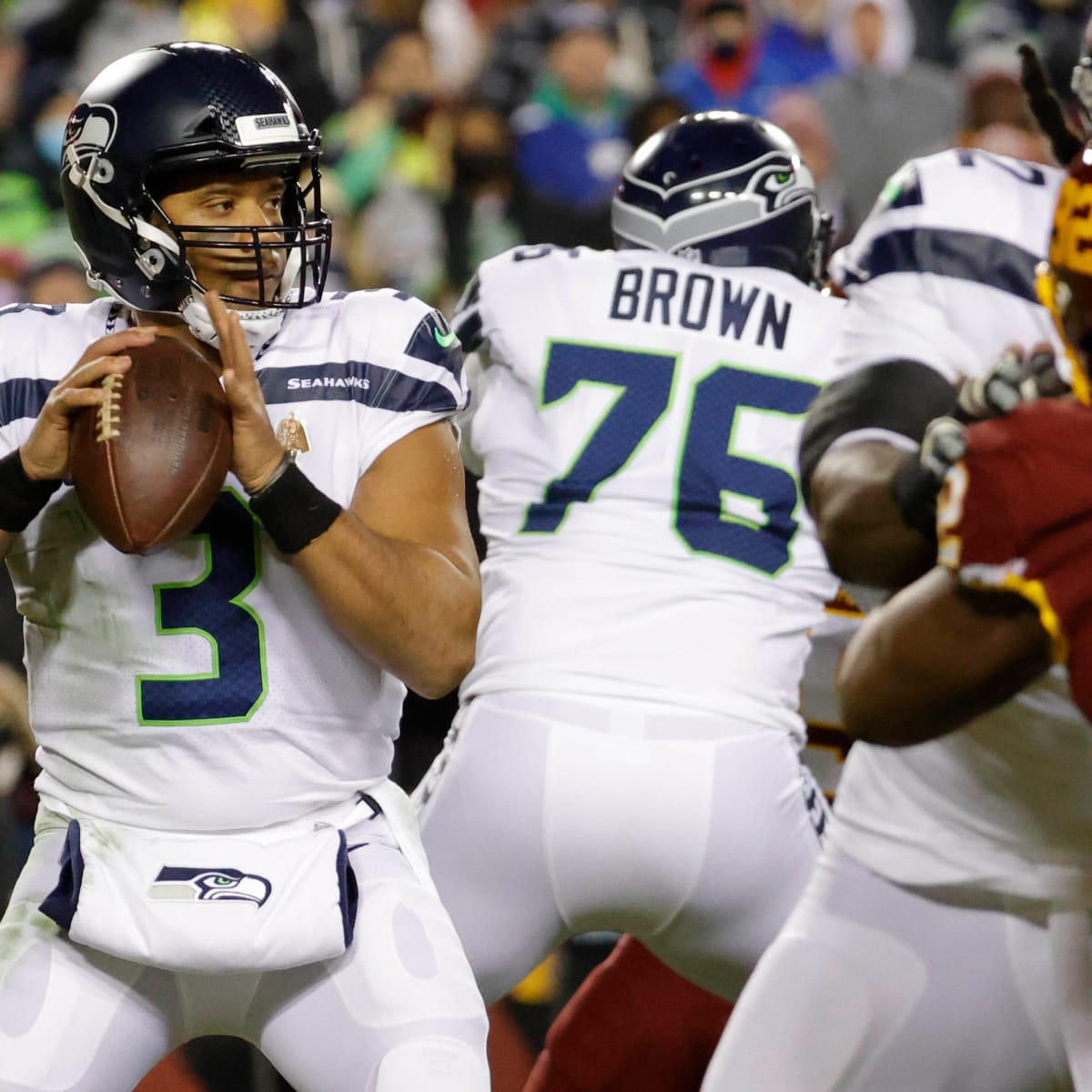 Seahawks star defender says Russell Wilson 'isn't going anywhere,' expects  QB to stay 'for a very long time' 