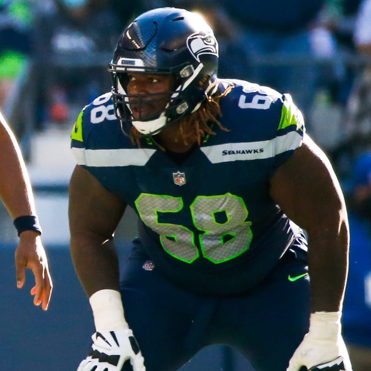 Seattle Seahawks guard Damien Lewis (68) gets set during an NFL football  game against the Carolina