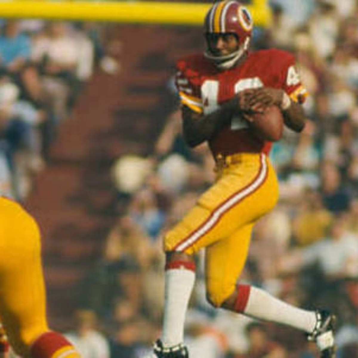 End Charley Taylor, 42, of the Washington Redskins leaps in vain