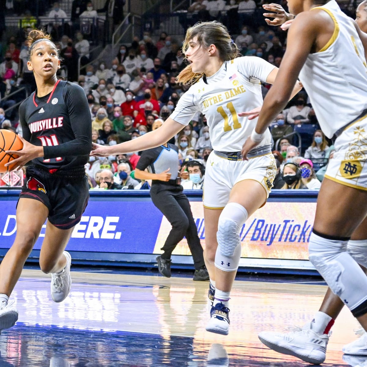 AT THE BUZZER, Louisville women get on a roll, romp over Notre Dame into  ACC title game, Sports