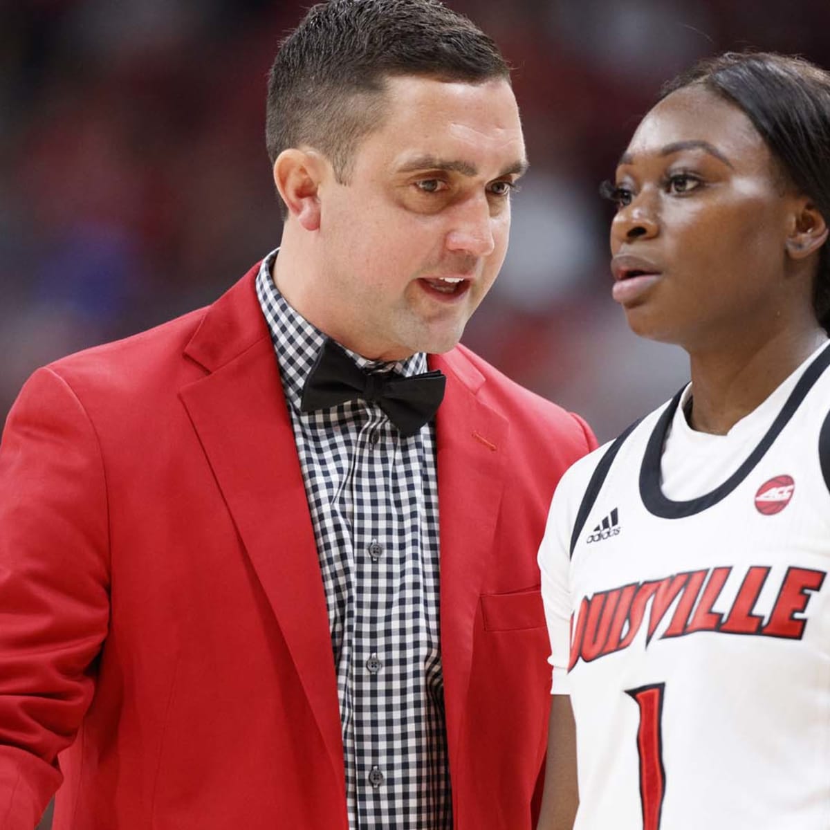 Louisville women's basketball coach installs gym slide - ESPN