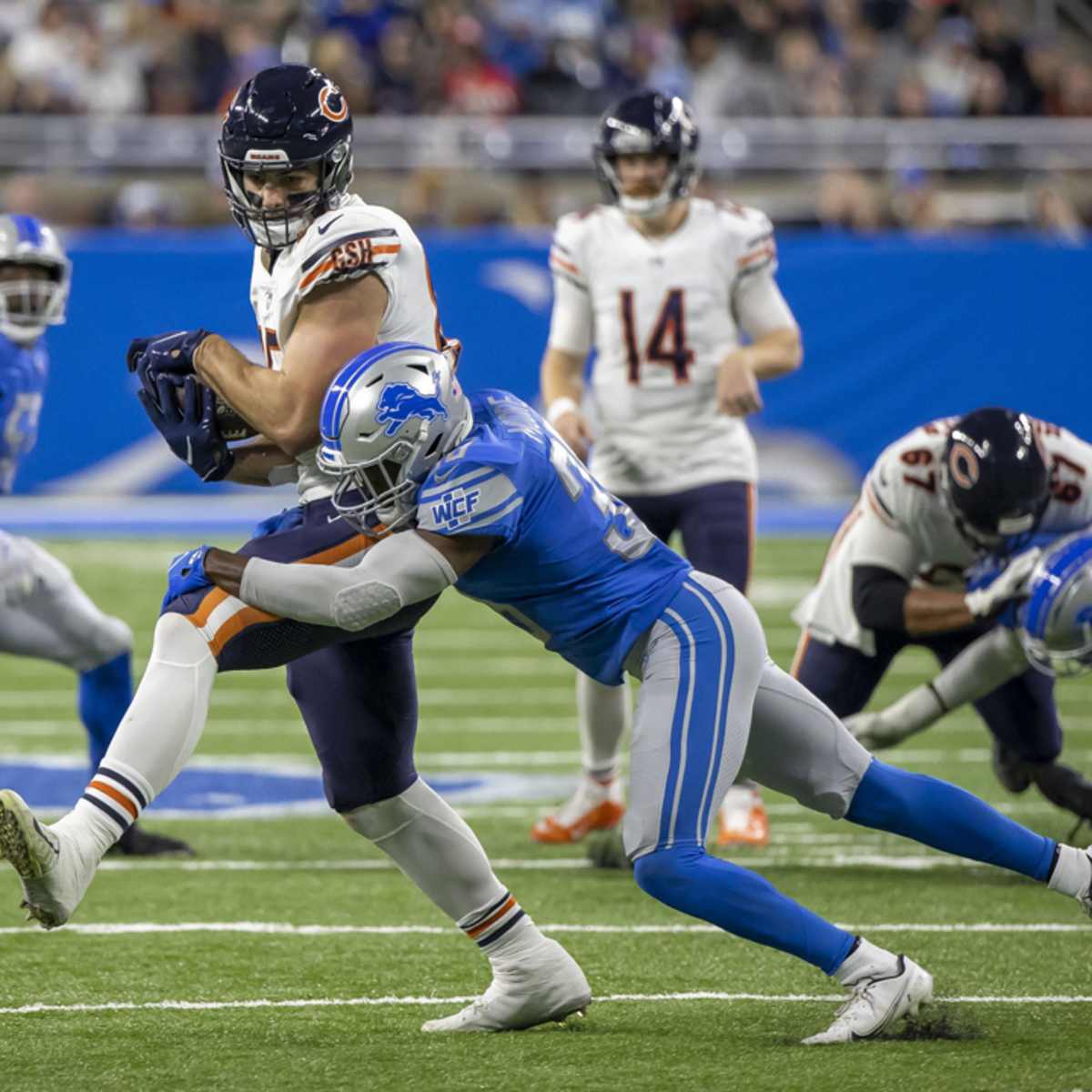 Detroit Lions safety C.J. Moore prays in the end zone before an