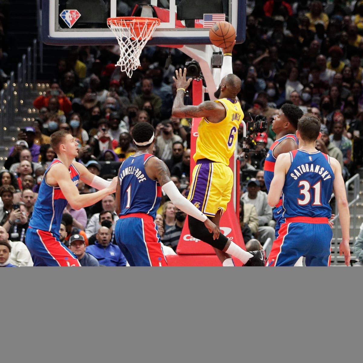 Karl Malone of the Utah Jazz goes for a dunk against the Houston