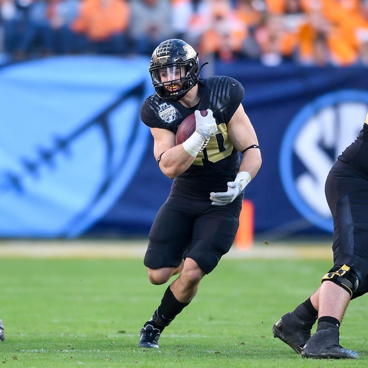 Running back Zander Horvath of the Purdue Boilermakers hurdles