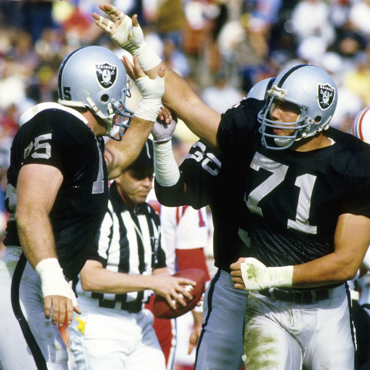 Los Angeles Raiders Lyle Alzado , Howie Long and Ted Hendricks