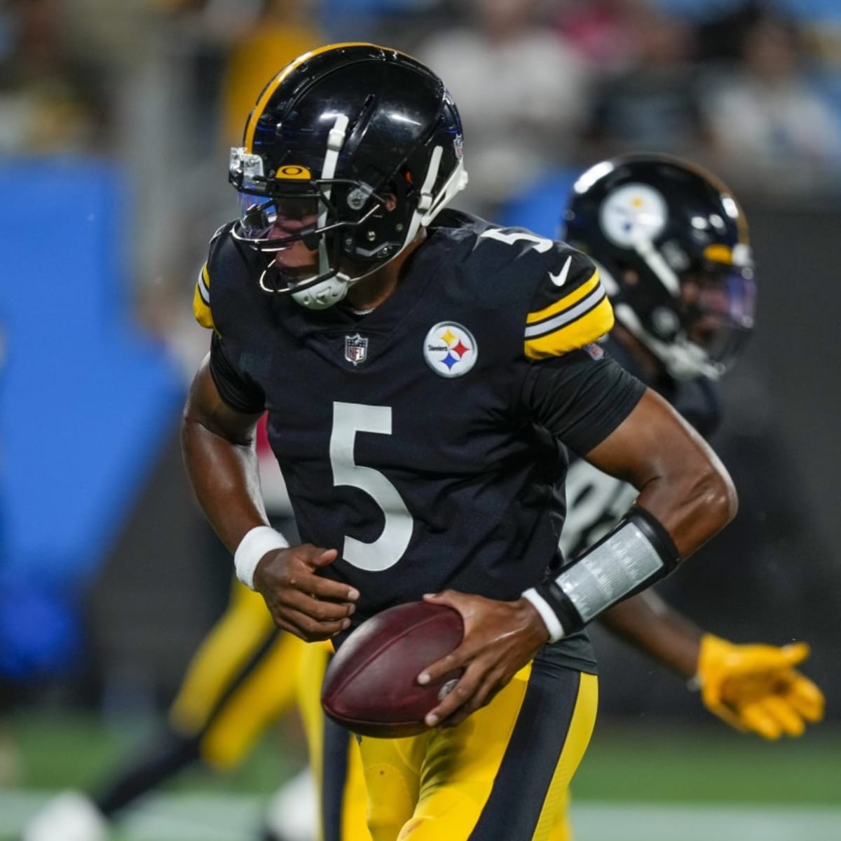 Cleveland Browns quarterback Joshua Dobbs (15) looks to hand off the ball  during an NFL pre-season football game against the Cleveland Browns,  Friday, Aug. 11, 2023, in Cleveland. (AP Photo/Kirk Irwin Stock