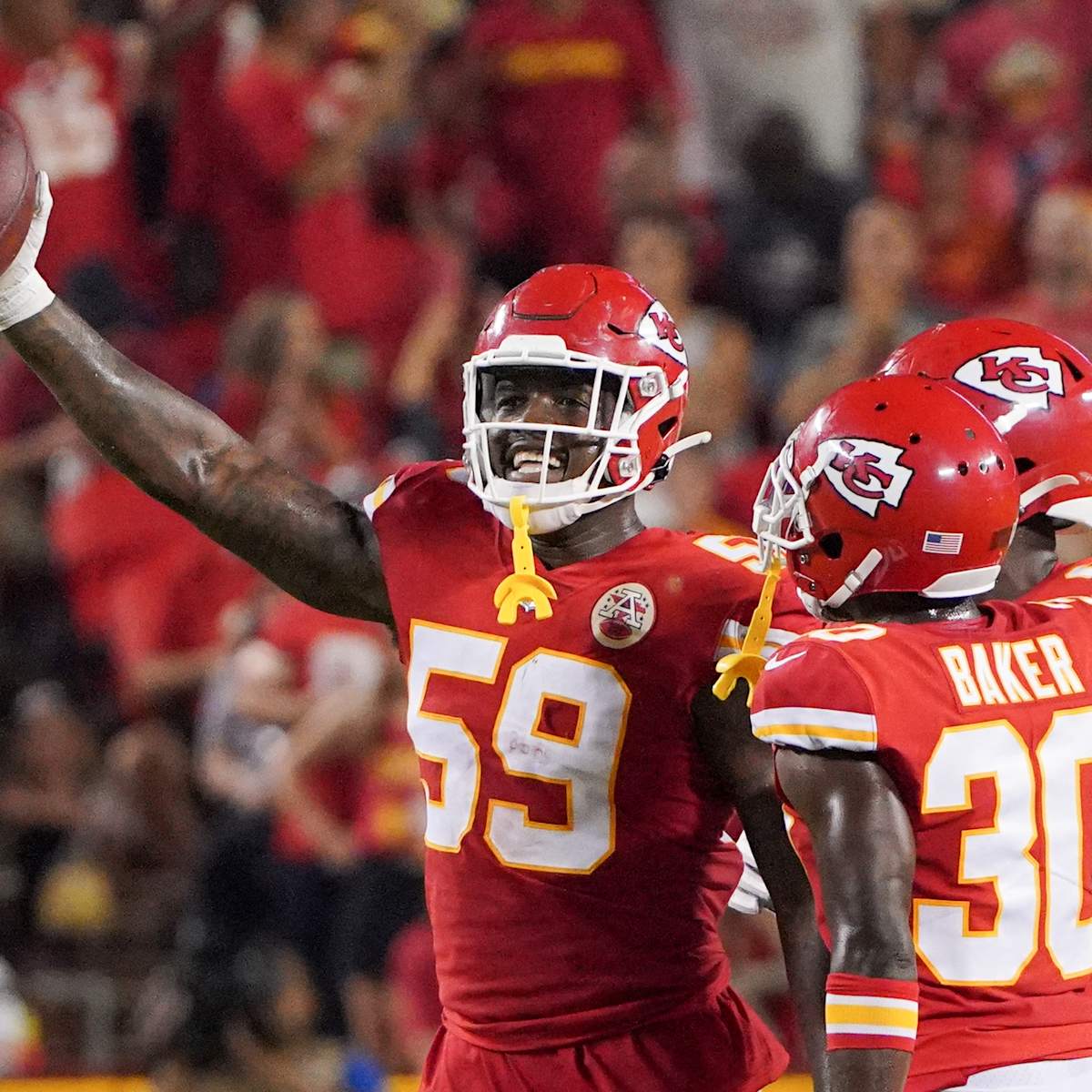 Kansas City Chiefs center Creed Humphrey (52) gets set on the line